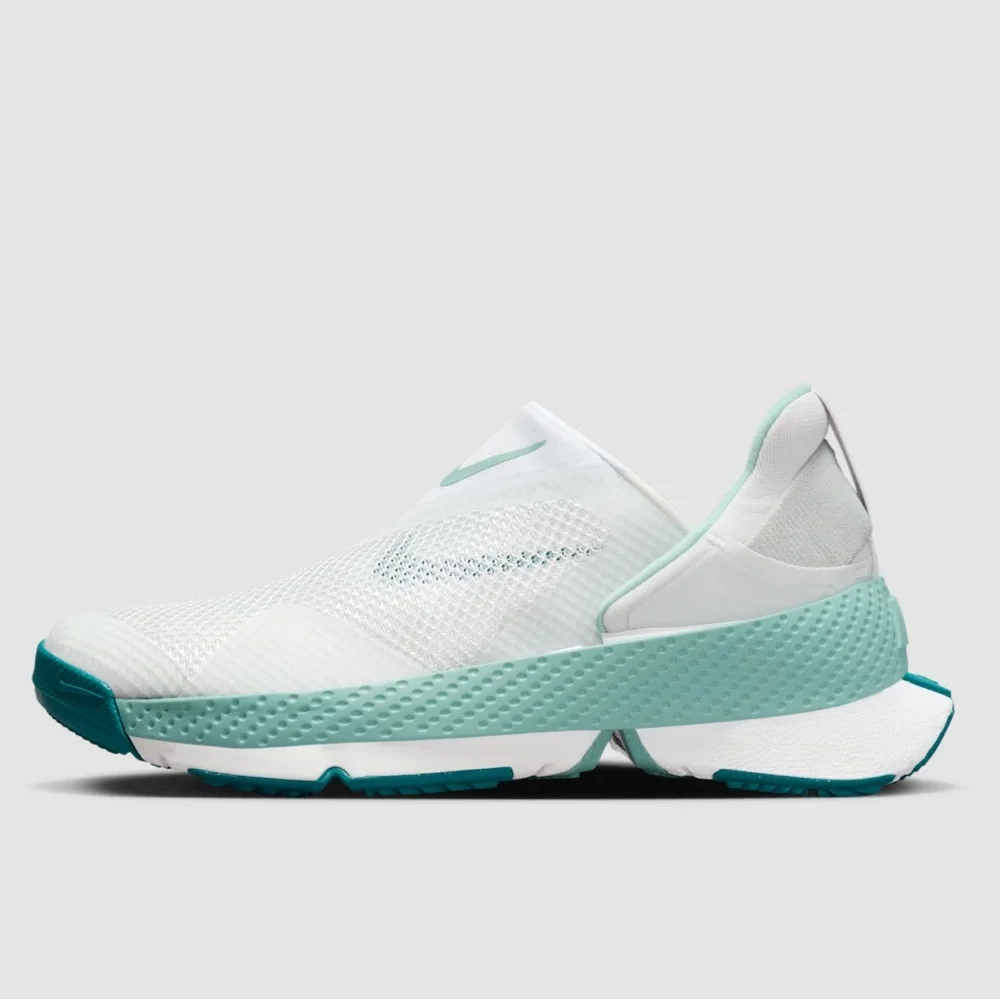 Nike Women’s Slip-On Sneakers in White and Teal